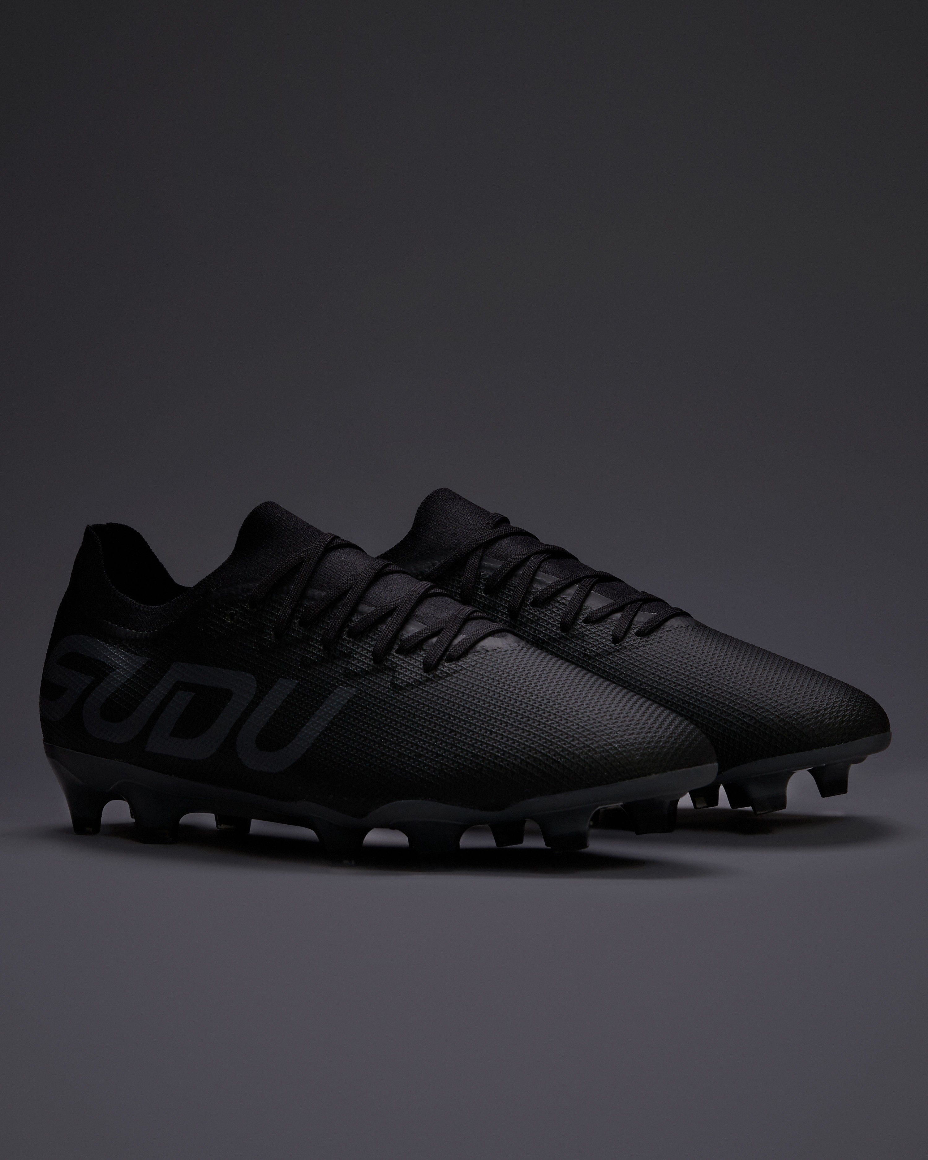 Plain black football boots best sale